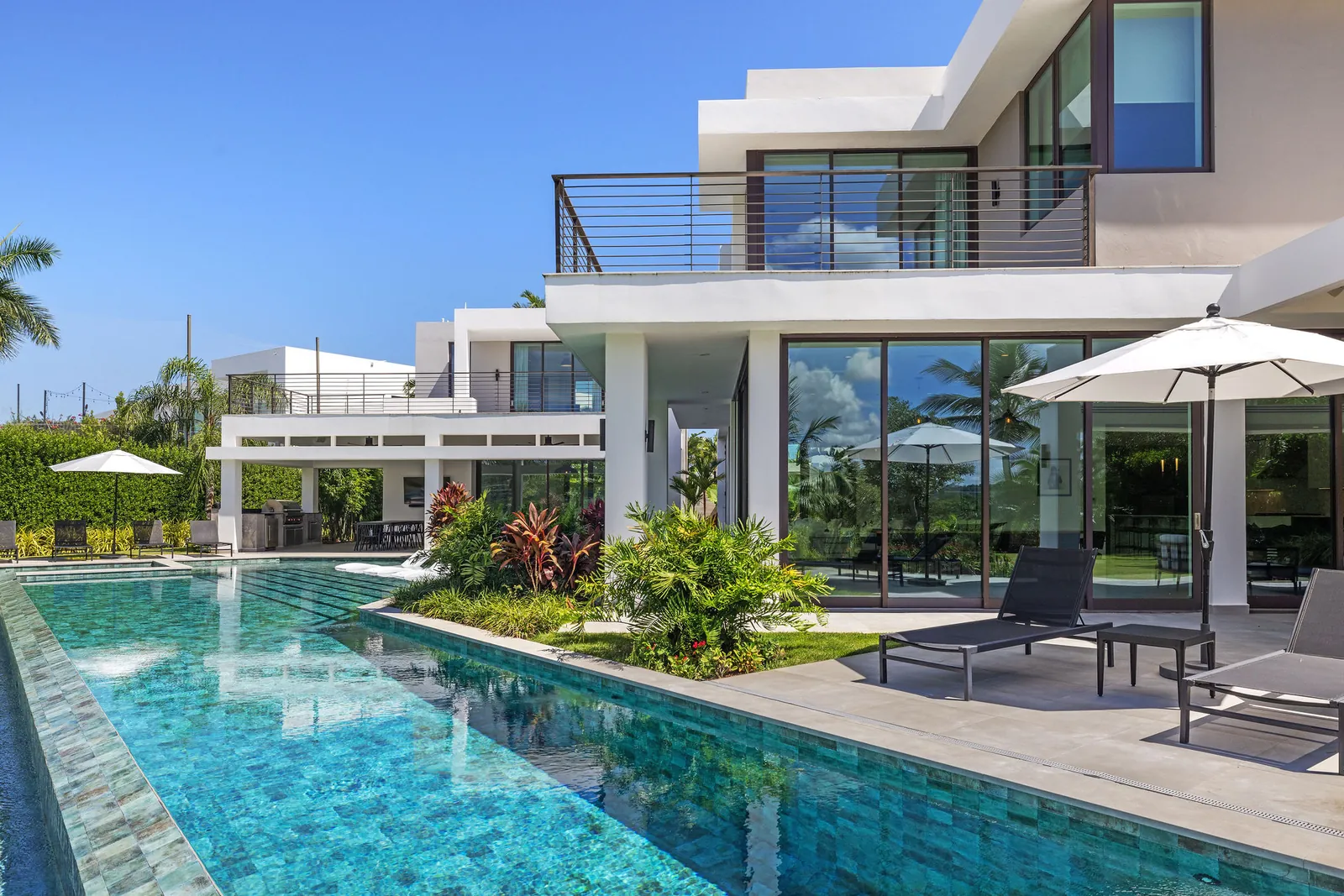 Modern home with an infinity-edge pool and outdoor terrace