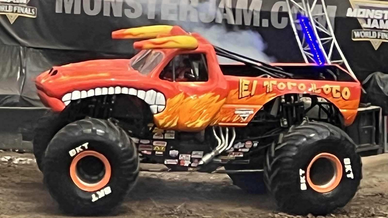Armando Castro driving El Toro Loco monster truck performing a wheelie