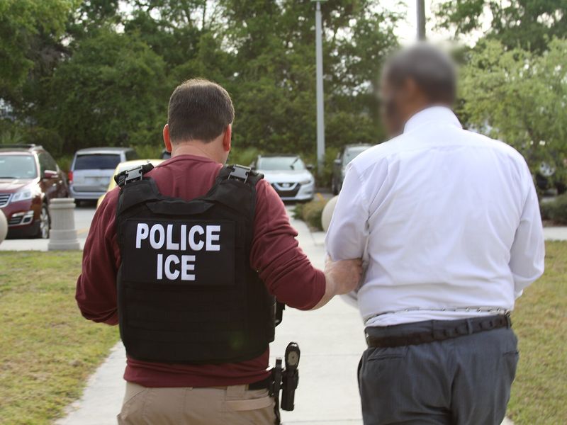 U.S. Immigration and Customs Enforcement officers during an arrest operation