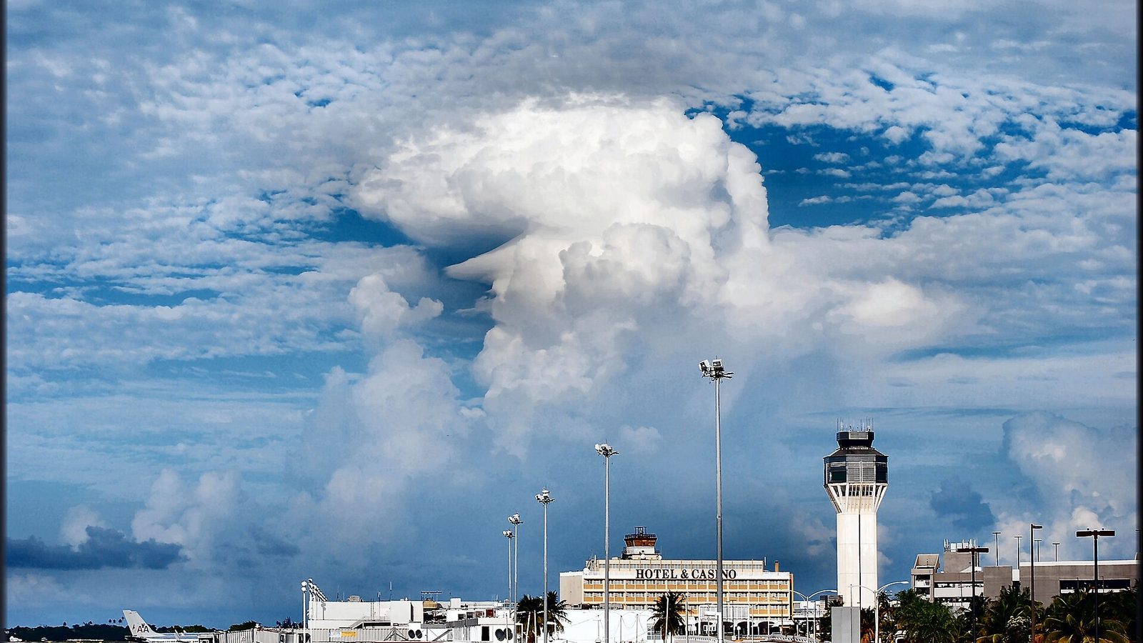 Luis Muñoz Marín International Airport under a big cloud, San Juan