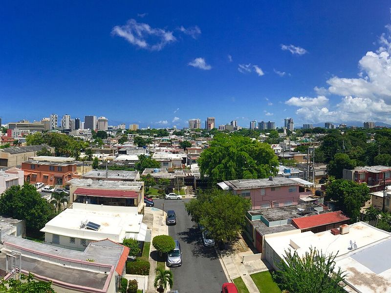 Panorama of San Juan from Hato Rey to Río Piedras, with El Yunque in the distance