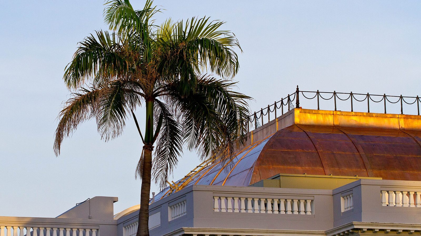 Exterior view of the Antiguo Casino de Puerto Rico building at sunset
