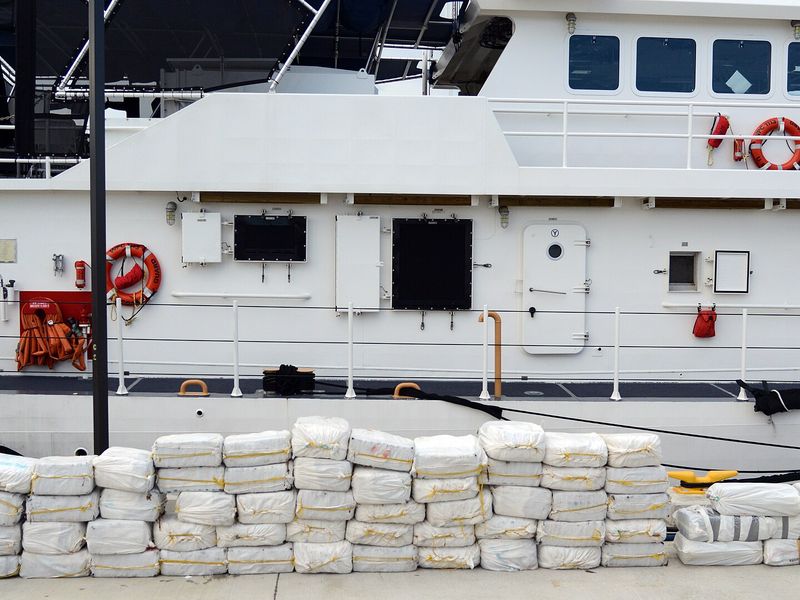 Coast Guard members offloading bales of cocaine at Coast Guard Base San Juan, Puerto Rico