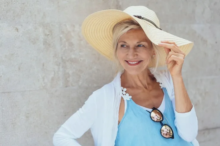 image of a woman wearing a large hat