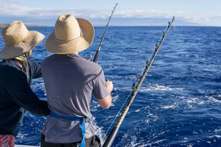 image of two man doing a fishing trip