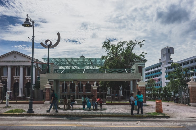 image of people waiting in bus stop