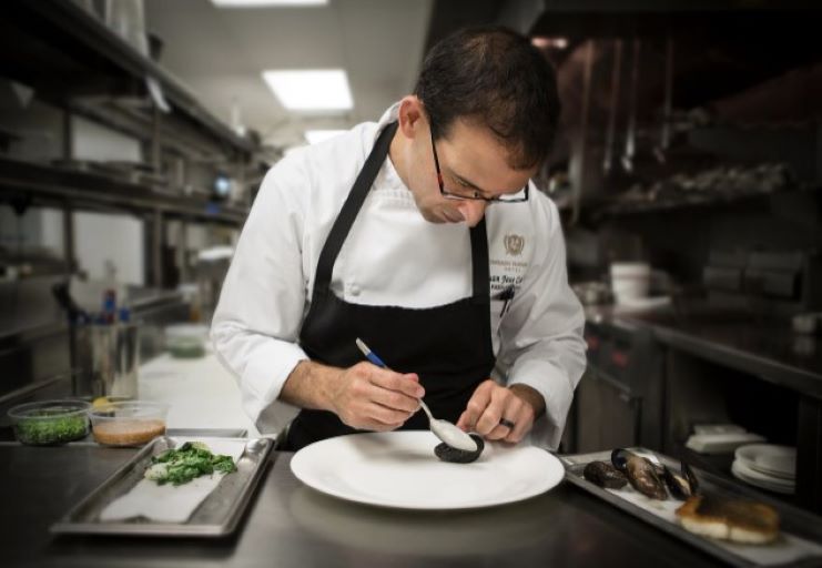 image of a chef preparing food