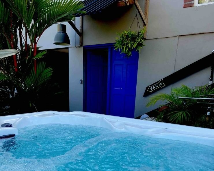 image of a pool and a blue door