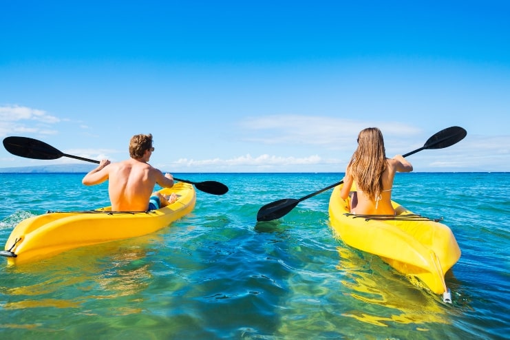 image of Couple Kayaking in the Ocean