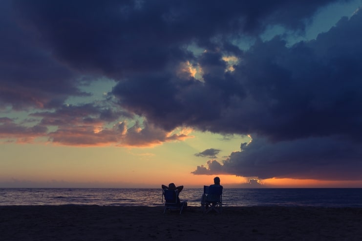 image of couple on the beach