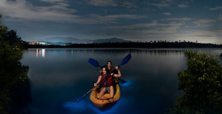 image of 2 girls kayaking at Laguna Grande Bio Bay