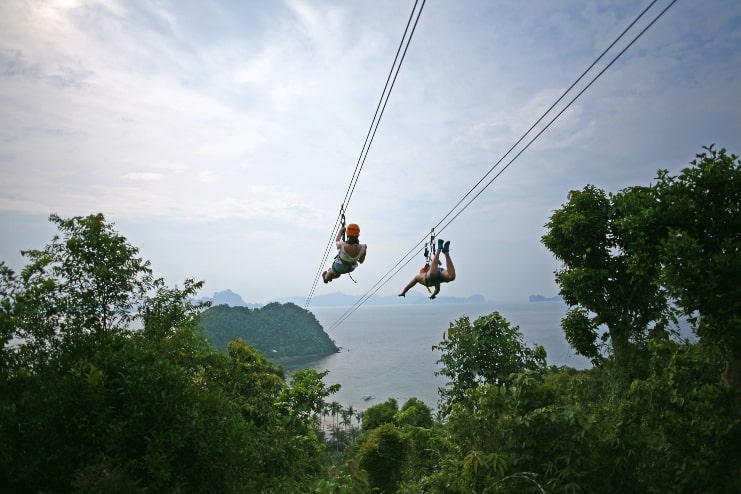 image of people doing a zipline