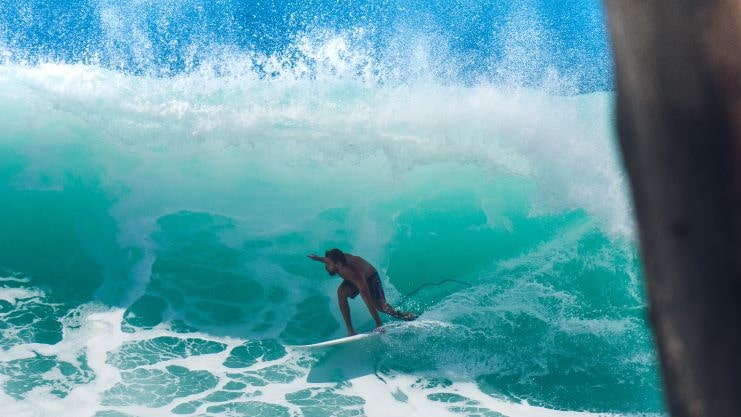 image of a guy surfing in Aguadilla