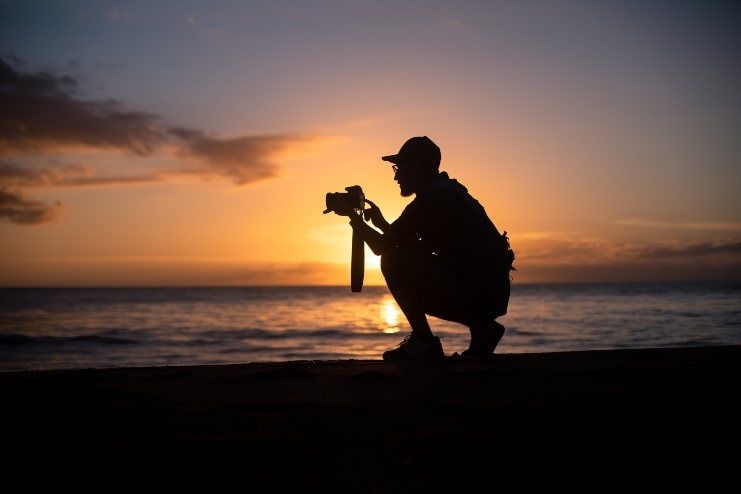 image of person holding a camera