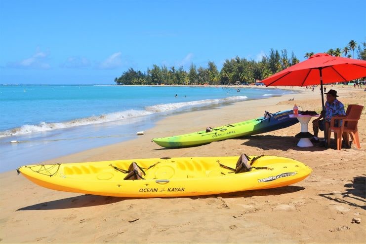 image of the kayak boats in Luquillo Beach