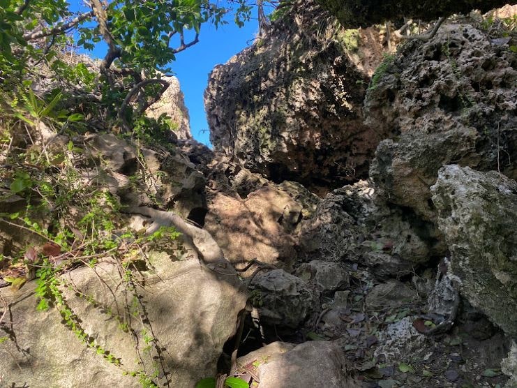 image of rocks that you need to climb towards the Survival Beach