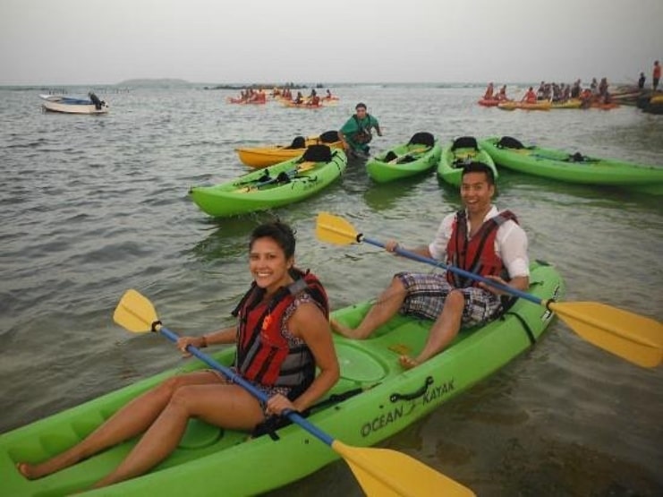 image of couple kayaking