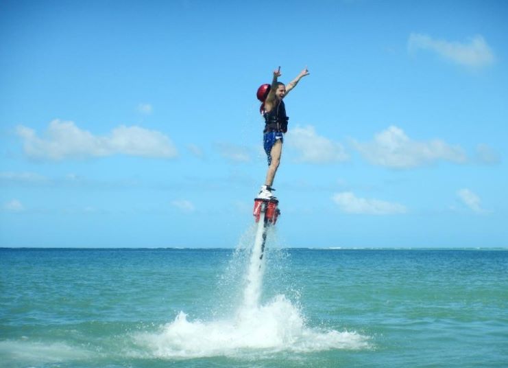 image of a girl in a flyboard