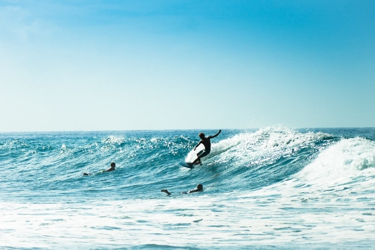 image of surfing boys