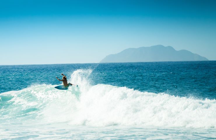 image of a guy surfing at Rincon