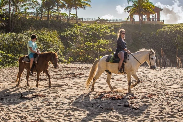 image of people riding a horse