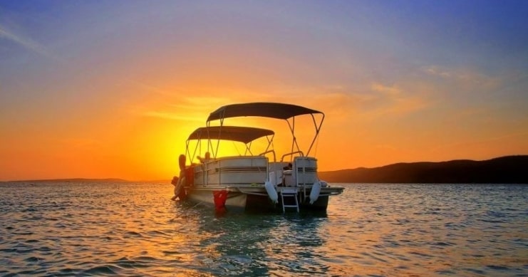 image of a yacht during sunset