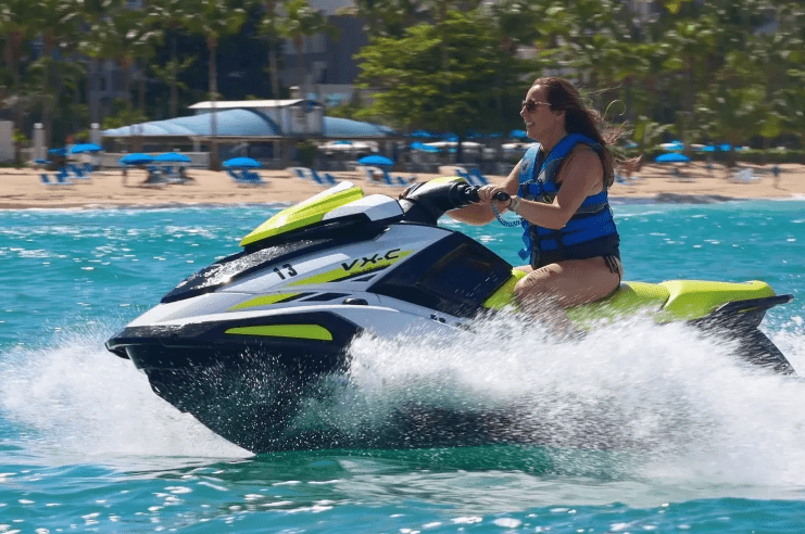 image of a woman riding a jet ski