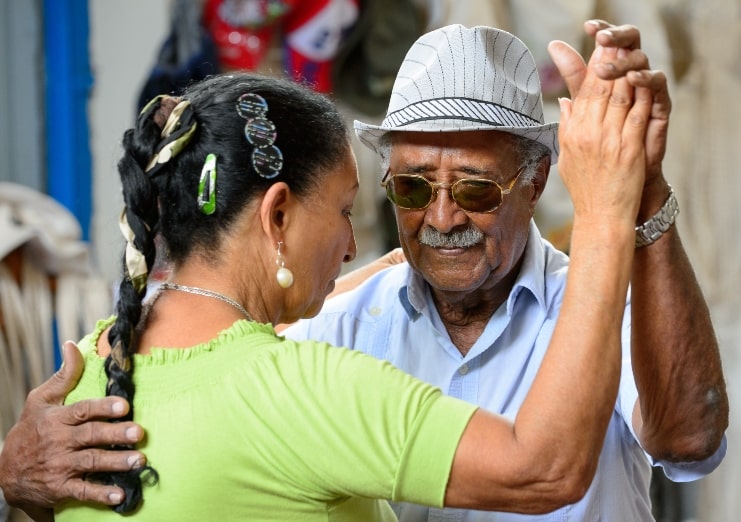 image of older couple dancing Salsa