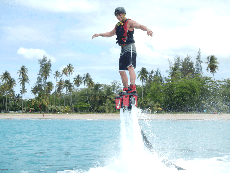 image of a guy riding a flyboard