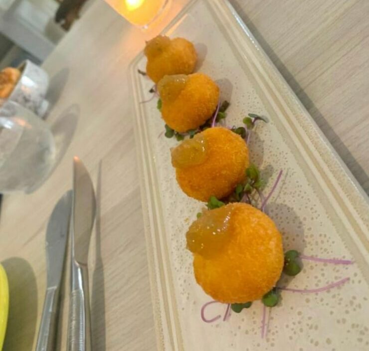 image of Gouda Croquetas topped with sweet papaya