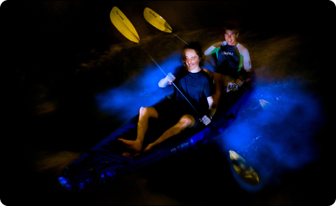 two men kayaking in a boat